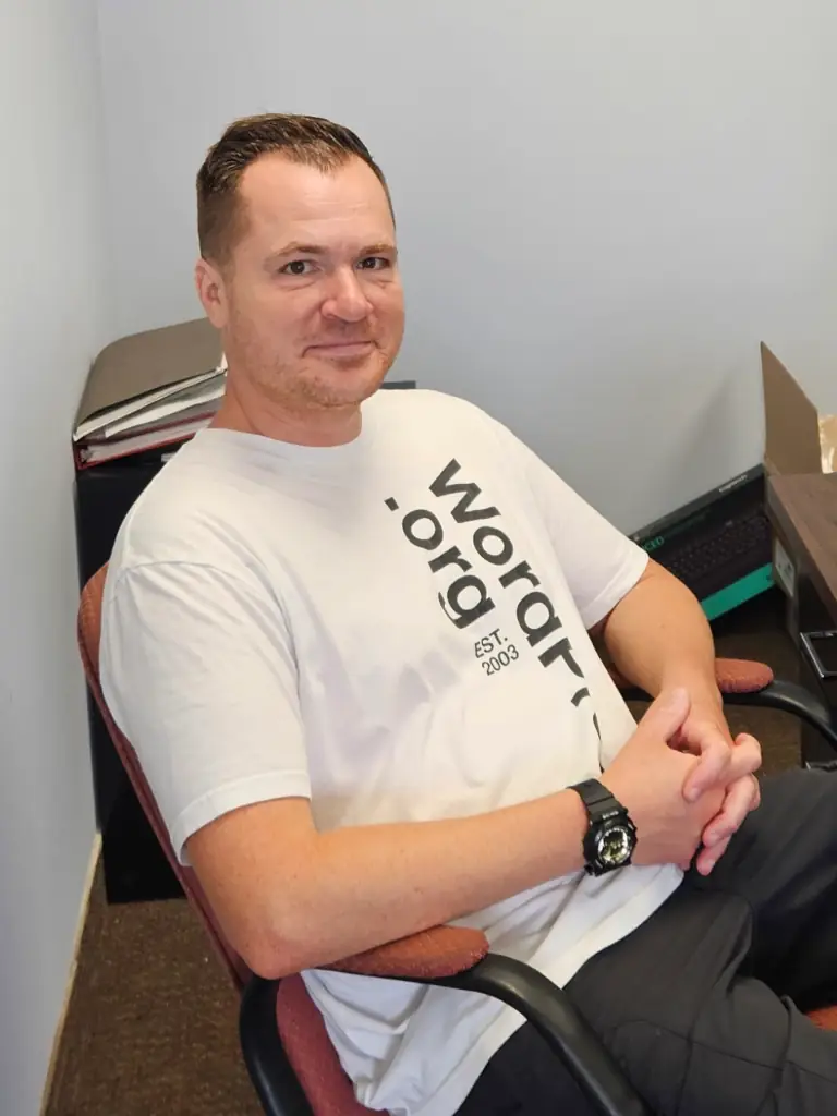 Jesse Lange, owner of Stack Media Design, in his office